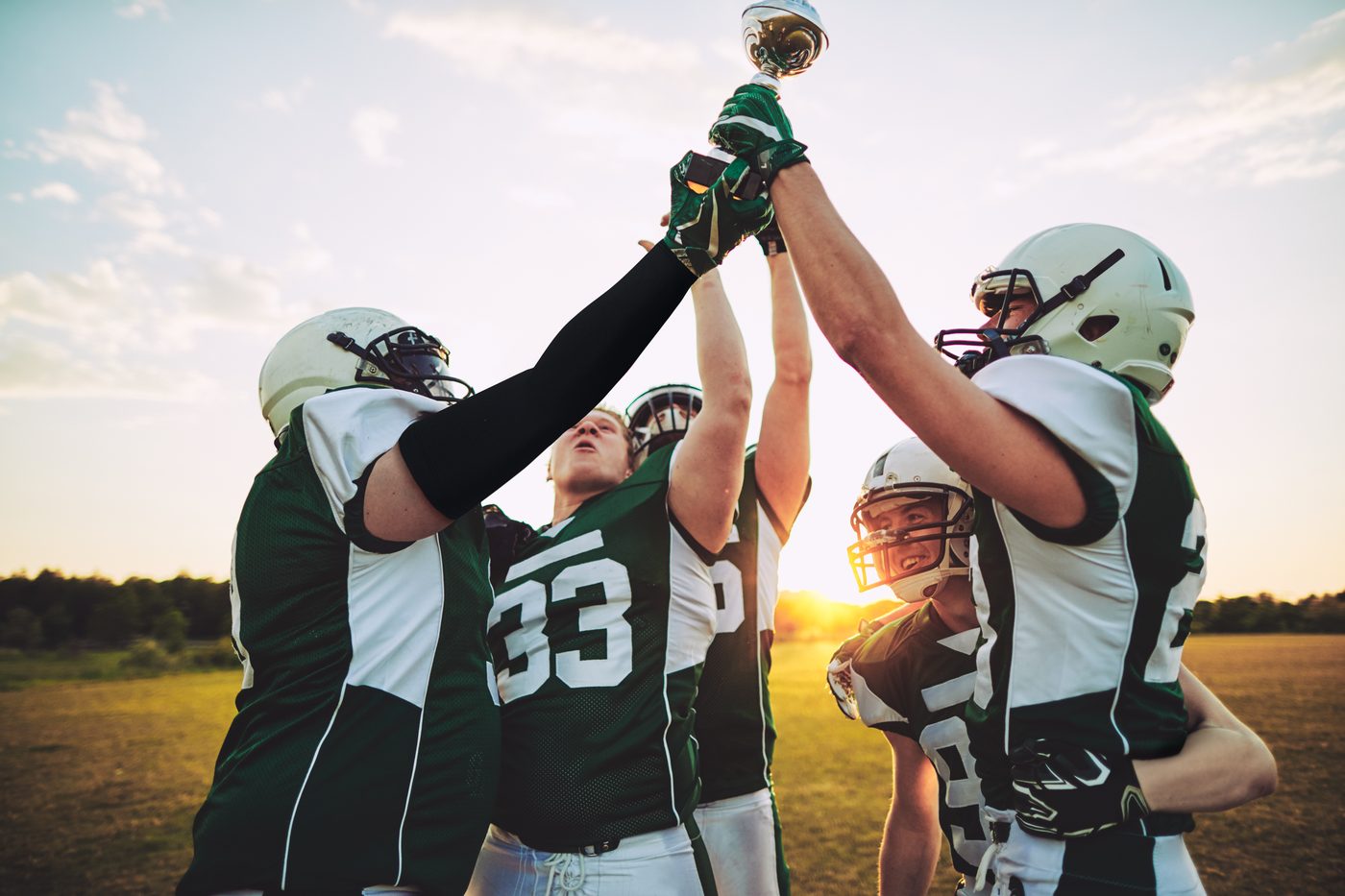 Football-Team nach einem erfolgreichen Spielzug